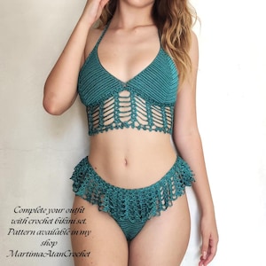 May include: A teal crochet bikini set featuring a halter-style top with a textured stitch pattern and an open-work midriff section. The matching bottoms include a ruffled edge detail. Text on the image reads: Complete your outfit with crochet bikini set. Pattern available in my shop MartimaAtanCrochet.