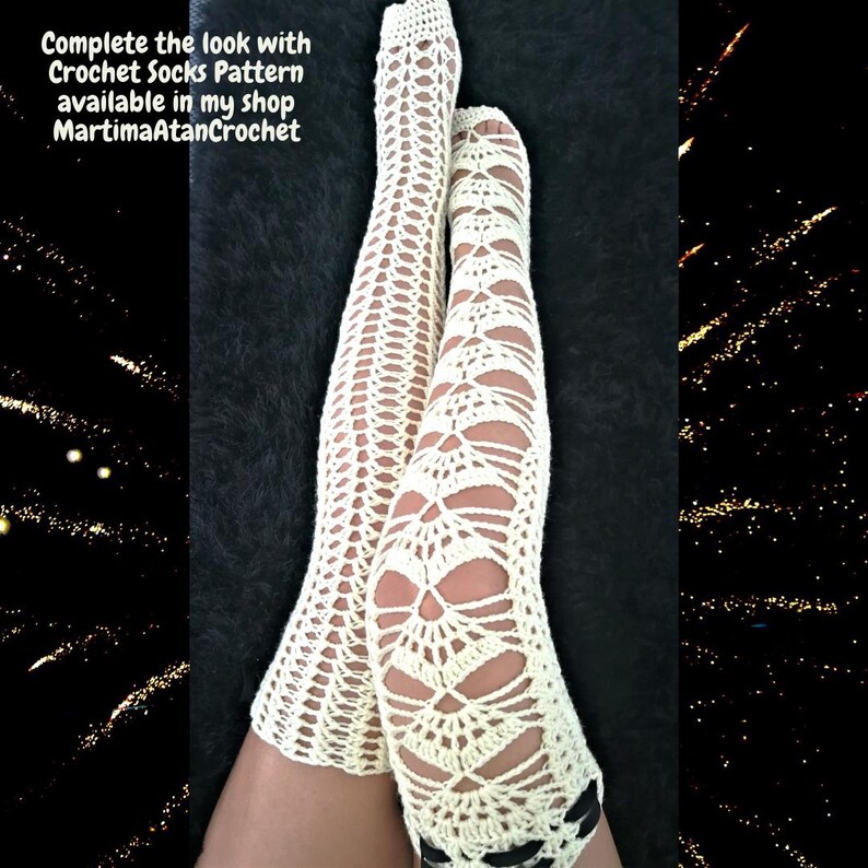 May include: Off-white crochet socks featuring an intricate openwork pattern. The text on the image reads: Complete the look with Crochet Socks Pattern available in my shop MartimaAtanCrochet. The socks extend up the leg.