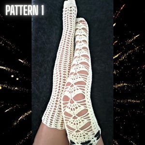 May include: Cream-colored, open-weave crochet thigh-high stockings. The stockings feature a decorative pattern with open areas and are labeled "PATTERN 1" in white text. The background is dark, with a sparkling effect on the right side.