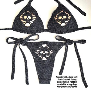 May include: A black crochet bikini set featuring a skull motif integrated into the fabric of the triangle top and the tie-side bottom. The text in the image reads: Complete the look with Skull Crochet String Bikini Bottom Pattern available in my shop MartimaAtanCrochet.