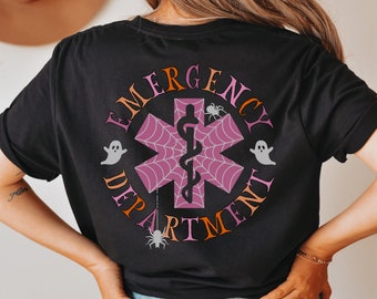 May include: Black t-shirt with a pink and orange graphic of a medical star with a snake and web design. The text "Emergency Department" surrounds the star.