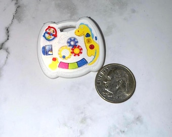 Miniaturowa zabawka edukacyjna dla niemowląt do łóżeczka w domku dla lalek