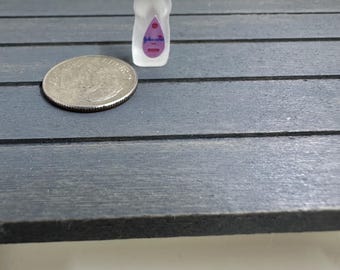 Aceite de bebé en miniatura para casa de muñecas hecho a mano a escala 1:12