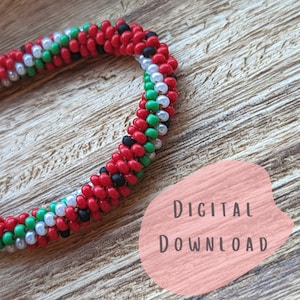 May include: A close-up of a red, green, white, and black beaded bracelet. The bracelet is coiled on a wooden surface. The text "DIGITAL DOWNLOAD" is visible in the background.