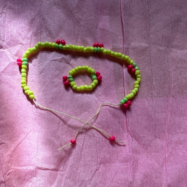 Ensemble bracelet et bague élastique fluo jaune rose