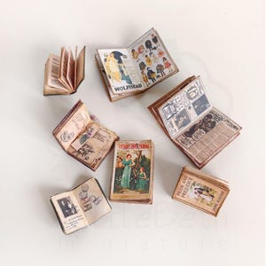 1:12 scale Victorian dollhouse miniature ephemera and accessory set. This printable digital kit features a vintage steamer trunk, floral photo album, personal journal, and over 200 nostalgic paper treasures. Designed by LittleBethMiniature for vintage dollhouse collectors.