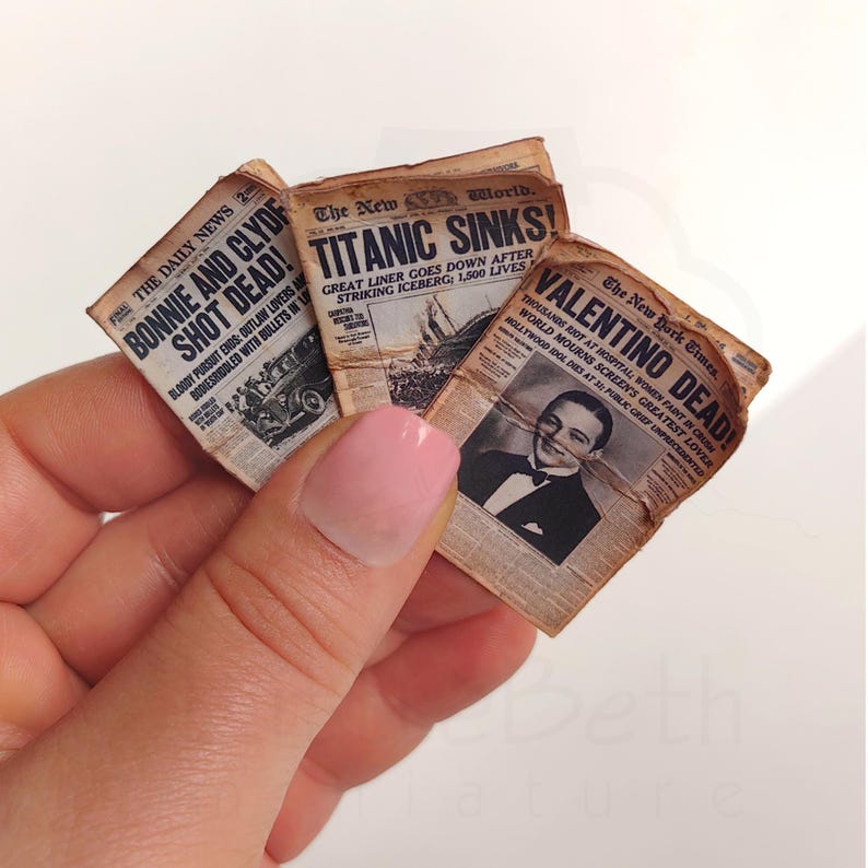1:12 scale Victorian dollhouse miniature ephemera and accessory set. This printable digital kit features a vintage steamer trunk, floral photo album, personal journal, and over 200 nostalgic paper treasures. Designed by LittleBethMiniature for vintage dollhouse collectors.