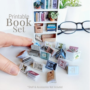 Peut inclure: Ensemble de livres miniatures avec des titres tels que "Frankenstein" et "Le Grand Gatsby." L'image présente une petite étagère blanche et le texte "Printable Book Set."