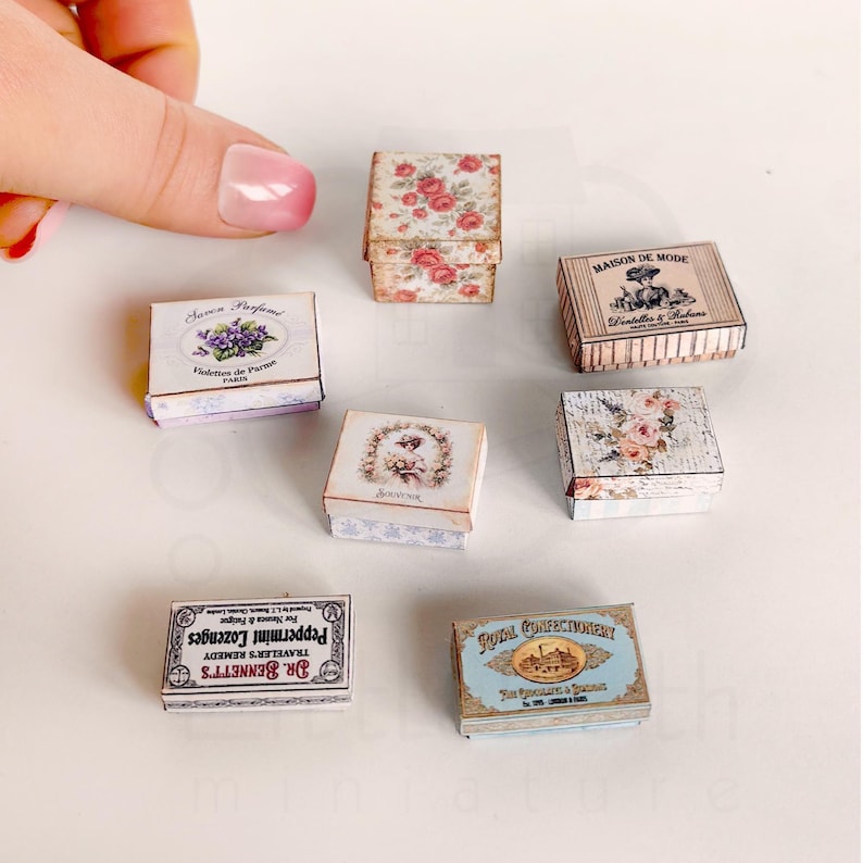 1:12 scale Victorian dollhouse miniature ephemera and accessory set. This printable digital kit features a vintage steamer trunk, floral photo album, personal journal, and over 200 nostalgic paper treasures. Designed by LittleBethMiniature for vintage dollhouse collectors.