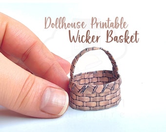 Könnte beinhalten: Druckbarer Korb aus Weidengeflecht für Puppenhäuser mit braunem und weißem gewebtem Design. Der Korb hat einen Griff und ist so gestaltet, dass er wie ein traditioneller Weidenkorb aussieht.