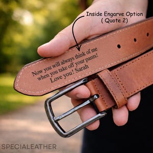 May include: A brown leather belt with a silver buckle. The inside of the belt is engraved with the text "Now you will always think of me when you take off your pants! Love you! Sarah."