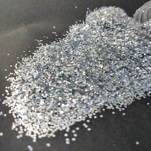 Chunky Silver polyester glitter 2.5 oz. in a shaker bottle