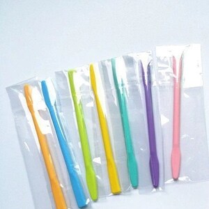 May include: Eight colorful plastic tools, packaged individually in clear plastic bags. The tools are various shades of blue, green, yellow, pink, and purple.