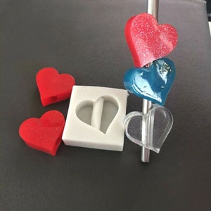 Defective Shiny silicone heart straw topper mold