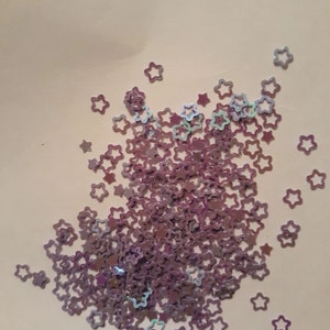 Purple Star mix glitter shapes mixes 1 oz. by weight in a shaker bottle