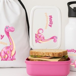 Set déjeuner enfant pour fille - Set scolaire dinosaure rose personnalisé avec sac de sport, bouteille d'eau, boîte à lunch - Cadeau de retour à l'école avec prénom personnalisé