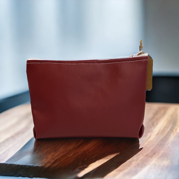 Small burgundy pouch