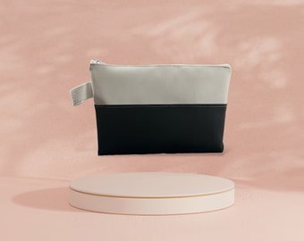 Large black/white zipped pouch in imitation leather