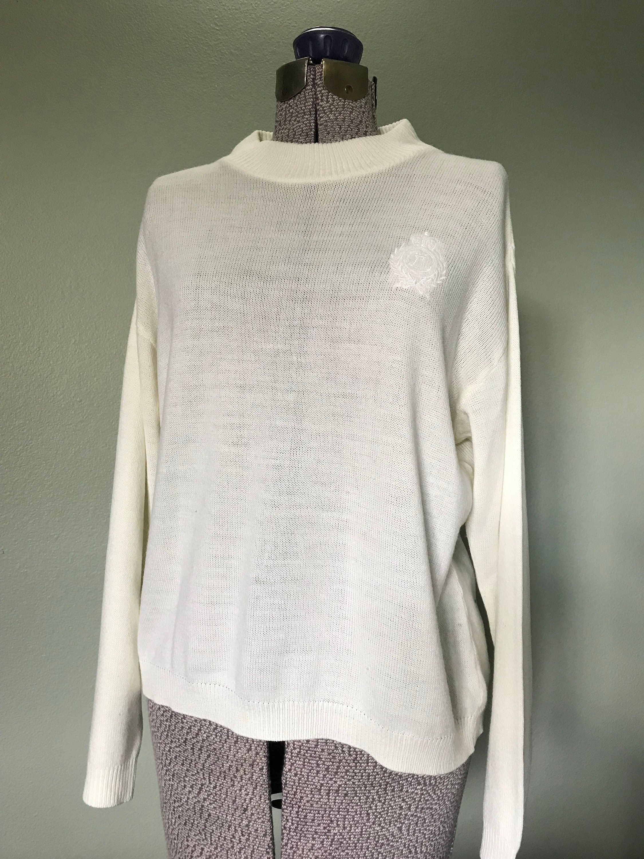 white embroidered sweater