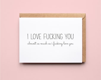 May include: A white rectangular greeting card with black text that reads I LOVE FUCKING YOU followed by the smaller text almost as much as i fucking love you. The card is tucked into a brown kraft paper envelope.
