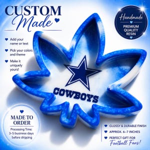 May include: A custom-made, blue and white resin ashtray in the shape of a leaf, featuring the Dallas Cowboys logo. The ashtray is approximately 6-7 inches and has a glossy finish. Text on the image includes "Custom Made" and "Cowboys".