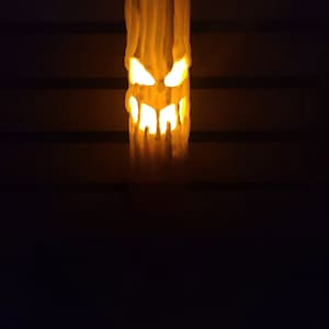 Flickering LED Candle Faces with Stand - Includes flickering tea light - Halloween Horror Decor