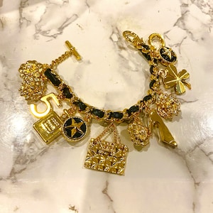 Vintage Chanel elements icon bracelet