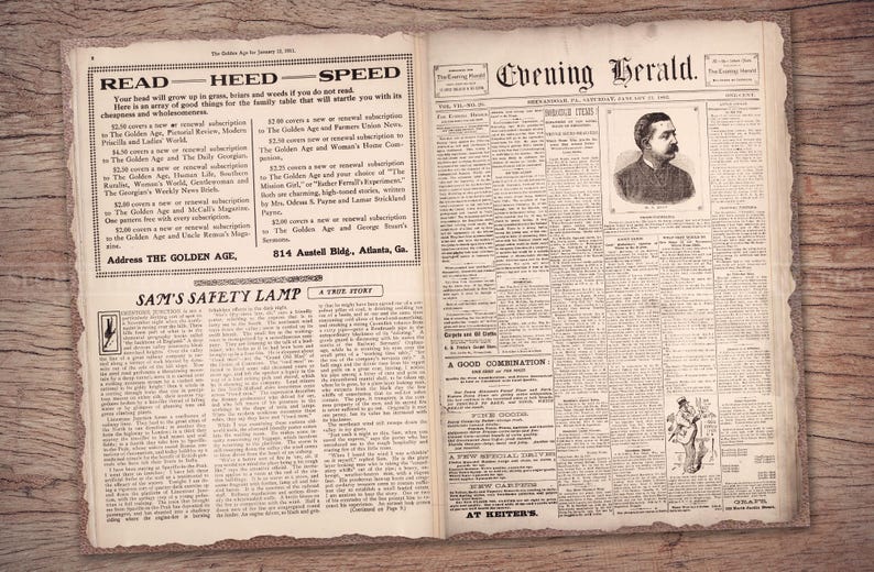 May include: A black and white newspaper page with the title "Evening Herald" and the text "READ HEED SPEED" and "SAM'S SAFETY LAMP".