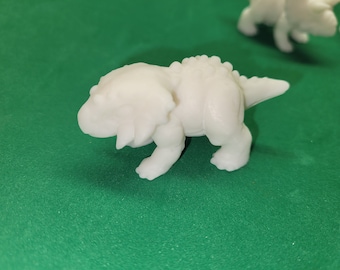 Scutosaurus hatchling by Five Death Customs
