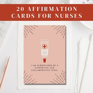 May include: A pink affirmation card with a black and white sunburst design. The card features a red and white tube of ointment with a red cross. The text on the card reads: "I am surrounded by a supportive and collaborative team."