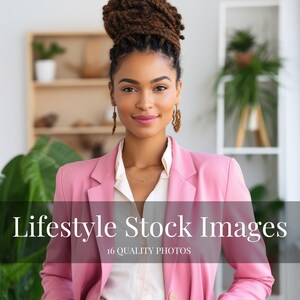 May include: A woman with brown braids in a bun is wearing a pink blazer and a white shirt. She is looking directly at the camera and smiling.