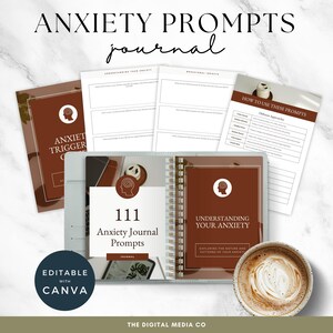 May include: An open journal with the title "111 Anxiety Journal Prompts" sits next to a cup of coffee. The journal is open to a page titled "Understanding Your Anxiety". Additional pages and a cover with the text "Anxiety Triggers" are also visible. The words "Editable with Canva" are also visible.