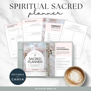 May include: A spiritual planner with the text "Spiritual Sacred Planner" at the top. The planner is open, revealing several pages with headings like "The Year Ahead" and "Contact Details." A coffee cup sits on the right. The planner is "Editable with Canva."