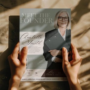 May include: A magazine held by hands, featuring the text "MEET THE FOUNDER" and the name "Chantelle Smith." The magazine also includes the text "QUICK FACTS AT A GLANCE" and "MY VALUES." The image shows a woman in a blazer holding a clipboard.