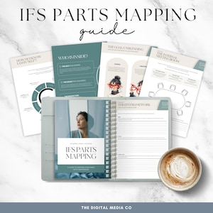 May include: A light blue journal with the text "IFS PARTS MAPPING" and "guide". Several informational pages and a cup of coffee with latte art are arranged around the journal. The text "THE DIGITAL MEDIA CO" is at the bottom.