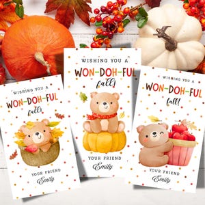 May include: Three fall-themed greeting cards with a bear illustration. Each card says "Wishing you a Won-Doh-Ful Fall!" and "Your Friend Emily." The cards feature a bear with leaves, a bear on a pumpkin, and a bear with a basket of apples.
