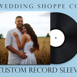 May include: A custom record sleeve with a black vinyl record and a white label. The front of the sleeve features a photograph of a couple in a field.