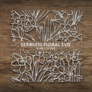 Peut inclure: Un dessin au trait blanc d'un motif floral sans couture représentant des fleurs et des feuilles de narcisses. Le texte "SEAMLESS FLORAL SVG NARCISSUS" est en haut de l'image.