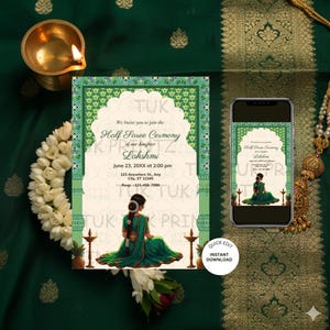 May include: An invitation for a Half Saree Ceremony, featuring a green and white design with the text "Half Saree Ceremony of our daughter Lakshmi". The invitation is displayed on a green fabric background, with a smartphone showing the invitation and a lit candle.