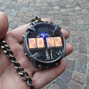 Nixie watch, Titanium Matrix watch, self made, with accelerometer and Wi-Fi.