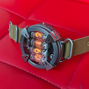 Nixie watch, Titanium handmade wrist watch with γ, β and X-ray radiation dosimeter.