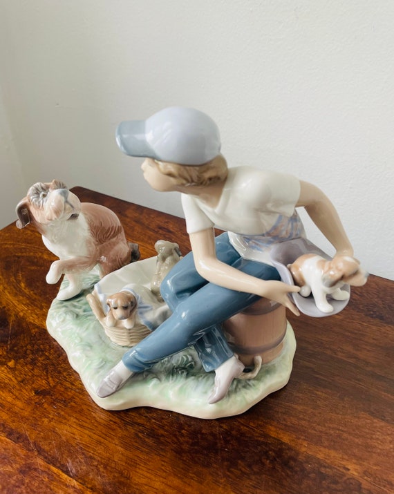 Lladro figurines boy with cheap dog
