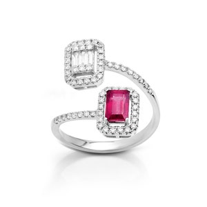 May include: A white gold ring with a red ruby and baguette diamonds set in a square halo.