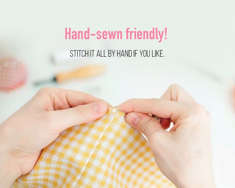 May include: A close-up of hands sewing yellow and white checkered fabric with a needle and thread. The text "Hand-sewn friendly!" and "STITCH IT ALL BY HAND IF YOU LIKE." are displayed in pink and black.