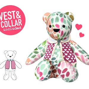 May include: A colorful patchwork teddy bear wearing a pink vest and white collar. The bear has a happy expression and is sitting on a white background. The text "VEST & COLLAR included" is in a pink circle above the bear.