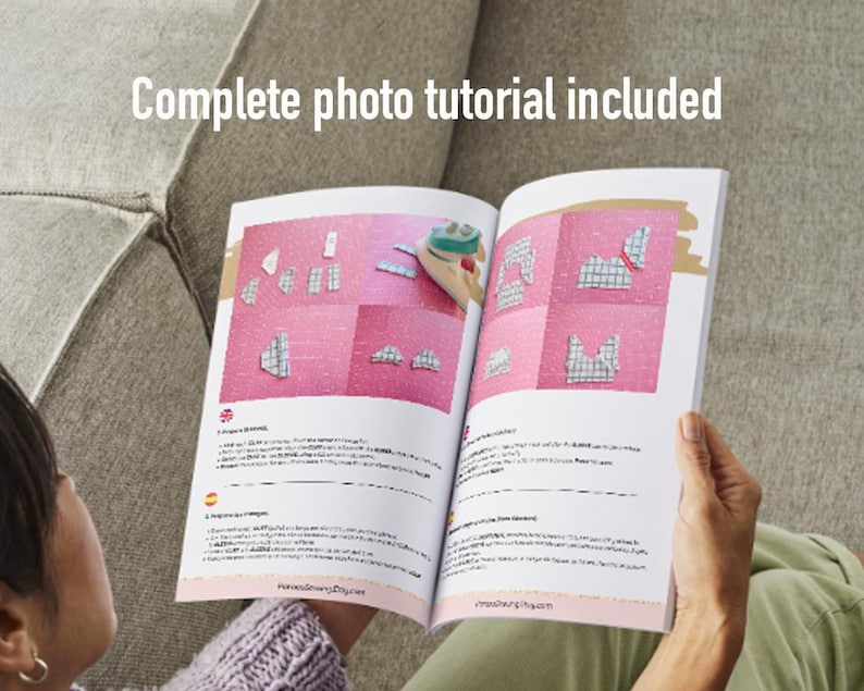 May include: An open book with pink pages displays a sewing tutorial with diagrams. The text "Complete photo tutorial included" is at the top. The book is held by a person sitting on a gray couch.