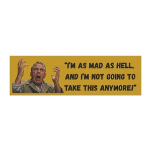 May include: A rectangular sign with a mustard yellow background features a man with an open mouth and raised hands. The text reads, "I'M AS MAD AS HELL, AND I'M NOT GOING TO TAKE THIS ANYMORE!"