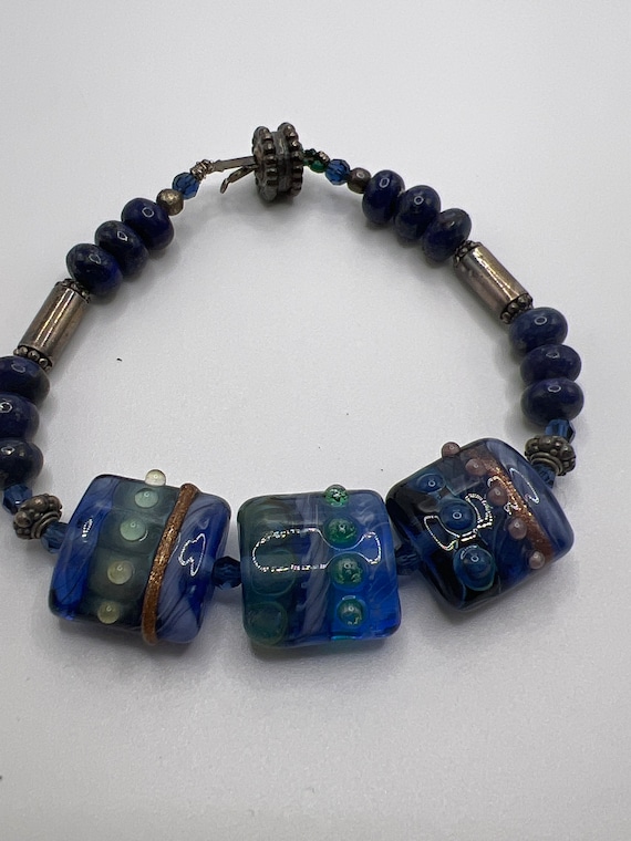 Lapis Lazuli and lamp work glass.