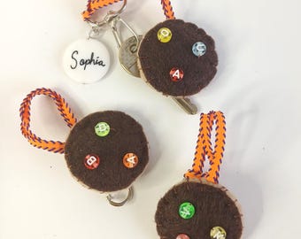 Custom initial letter biscuit keyring, bag charm; patisserie branding promotion