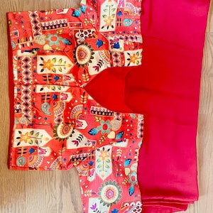 Beautiful georgette saree with attached blouse.